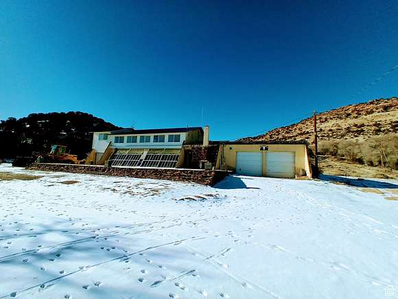 10.25 Acres of Recreational Land with Home for Sale in Manila, Utah