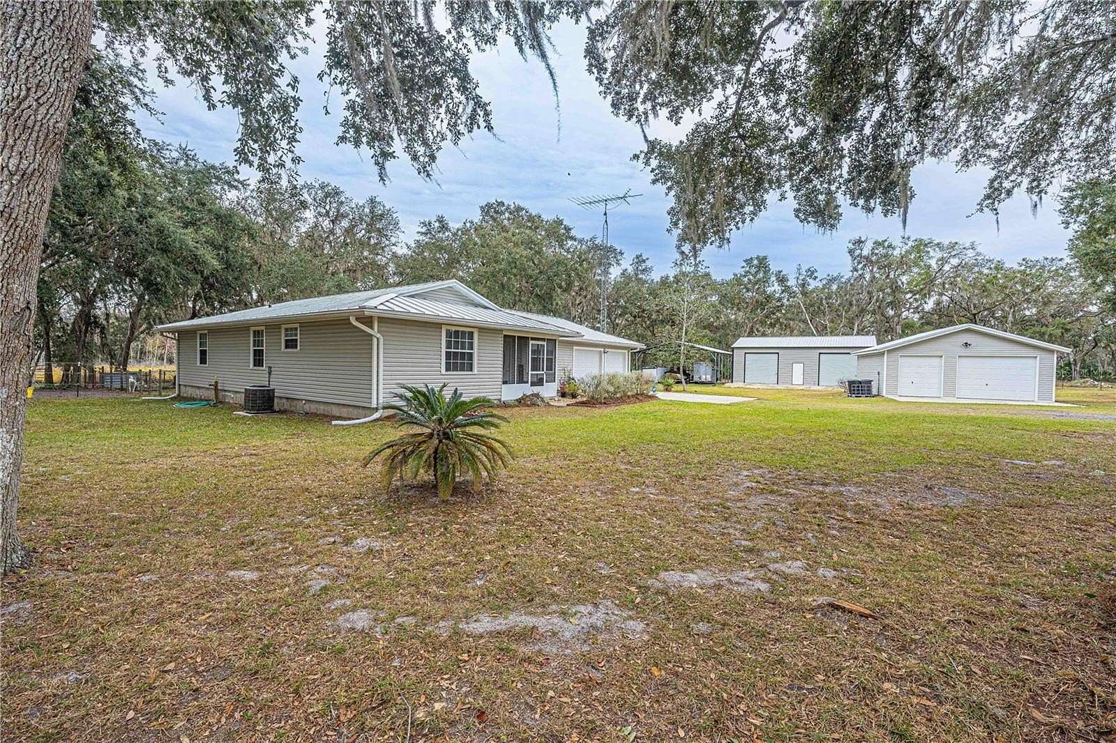 8.3 Acres of Land with Home for Sale in Lake Panasoffkee, Florida