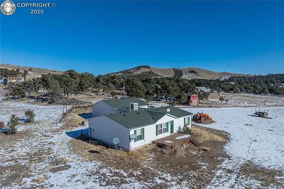 4.83 Acres of Residential Land with Home for Sale in Cotopaxi, Colorado