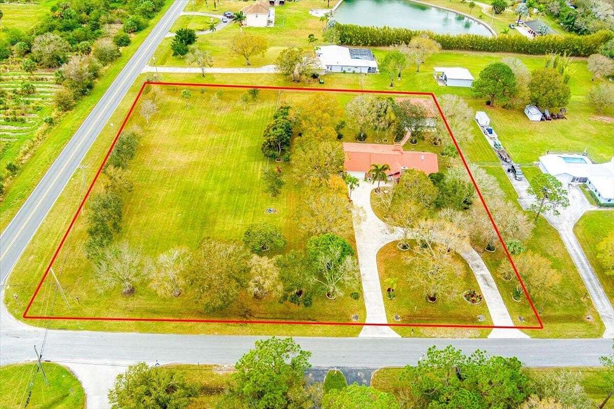 2.219 Acres of Residential Land with Home for Sale in Fort Pierce, Florida