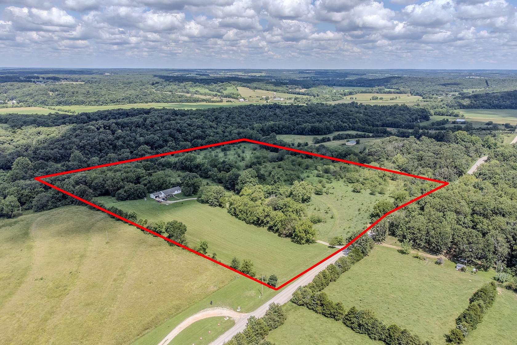 40 Acres of Land with Home for Sale in Niangua, Missouri