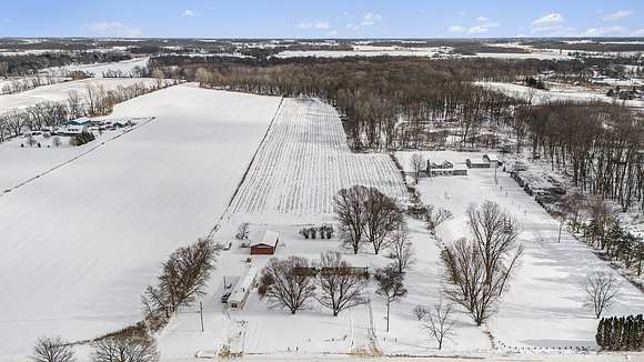 21.3 Acres of Land with Home for Sale in Lake Odessa, Michigan