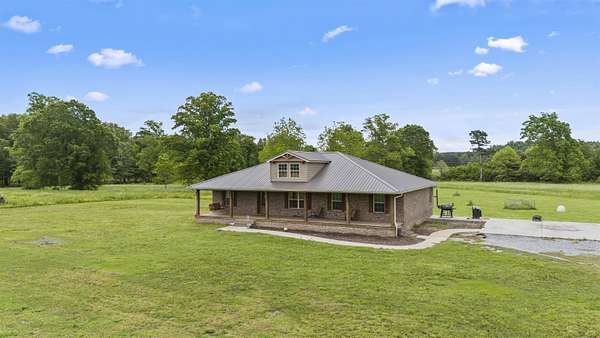 13.7 Acres of Land with Home for Sale in Hanceville, Alabama