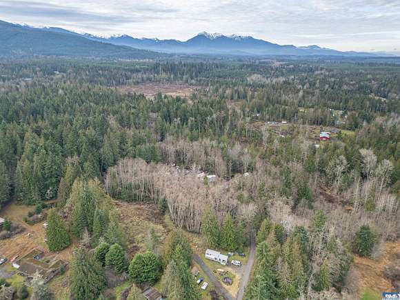 5.05 Acres of Residential Land with Home for Sale in Sequim, Washington