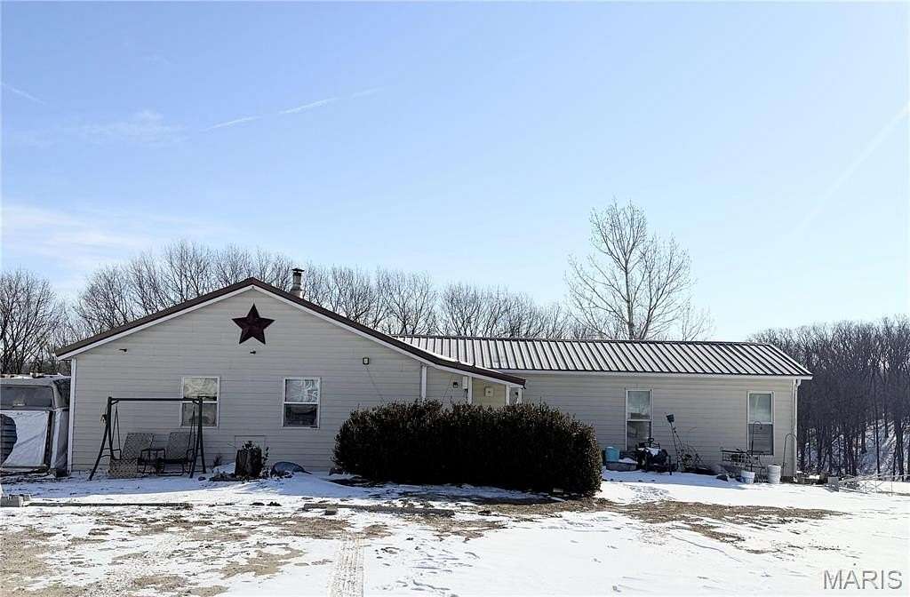 9 Acres of Land with Home for Sale in Prairie Township, Missouri