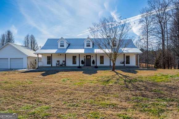 19.34 Acres of Land with Home for Sale in Clermont, Georgia