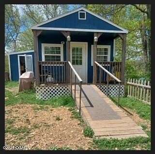 1 Acre of Residential Land with Home for Sale in Pineville, Missouri