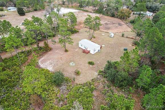 5.89 Acres of Residential Land with Home for Sale in Crystal River, Florida