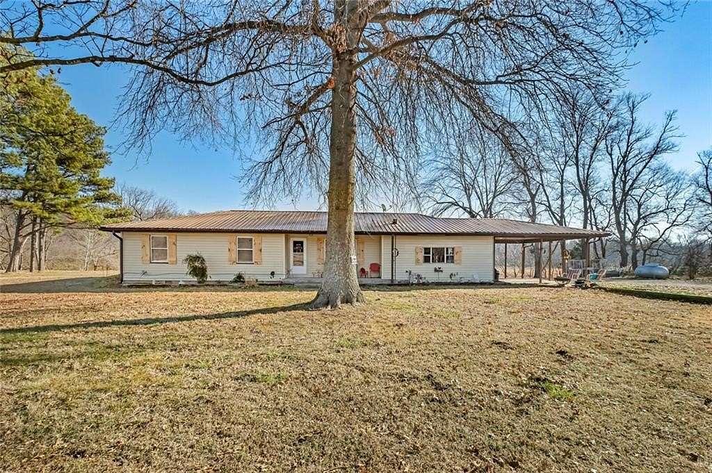 10 Acres of Residential Land with Home for Sale in Watts, Oklahoma