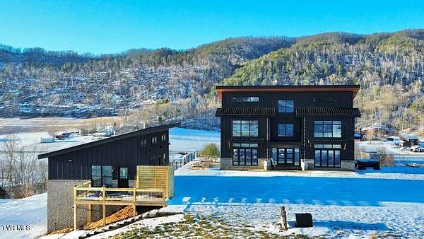 4.5 Acres of Residential Land with Home for Sale in Mountain City, Tennessee