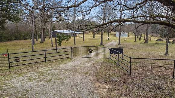 4.943 Acres of Residential Land with Home for Sale in Troup, Texas