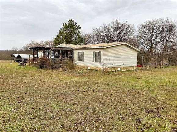 16.23 Acres of Land with Home for Sale in Hulbert, Oklahoma