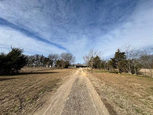 3.89 Acres of Residential Land with Home for Sale in Paris, Texas