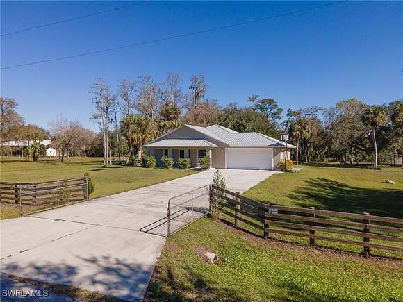 2.26 Acres of Residential Land with Home for Sale in Fort Denaud, Florida