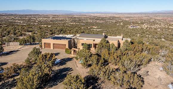 10 Acres of Residential Land with Home for Sale in Sandia Park, New Mexico