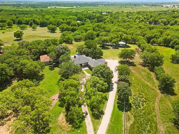 5 Acres of Land with Home for Sale in Sanger, Texas
