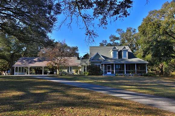 48.5 Acres of Land with Home for Sale in Oxford, Florida