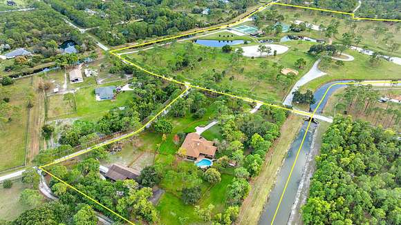 5.019 Acres of Land with Home for Sale in Palm Beach Gardens, Florida