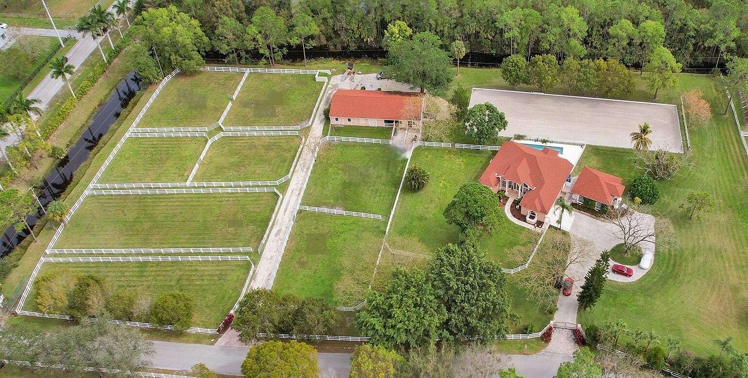 6.43 Acres of Land with Home for Sale in Loxahatchee Groves, Florida