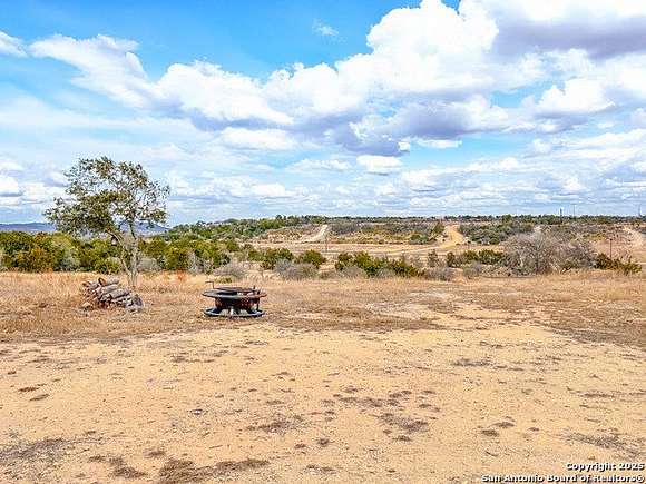 10.04 Acres of Recreational Land with Home for Sale in Bandera, Texas