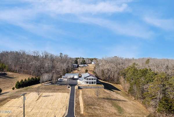 3.5 Acres of Residential Land with Home for Sale in Dandridge, Tennessee