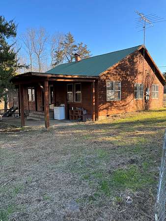 235 Acres of Land with Home for Sale in Bluffton, Arkansas