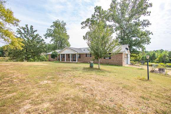 17.64 Acres of Land with Home for Sale in Corinth, Mississippi