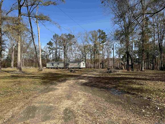 4 Acres of Residential Land with Home for Sale in Springfield, Louisiana