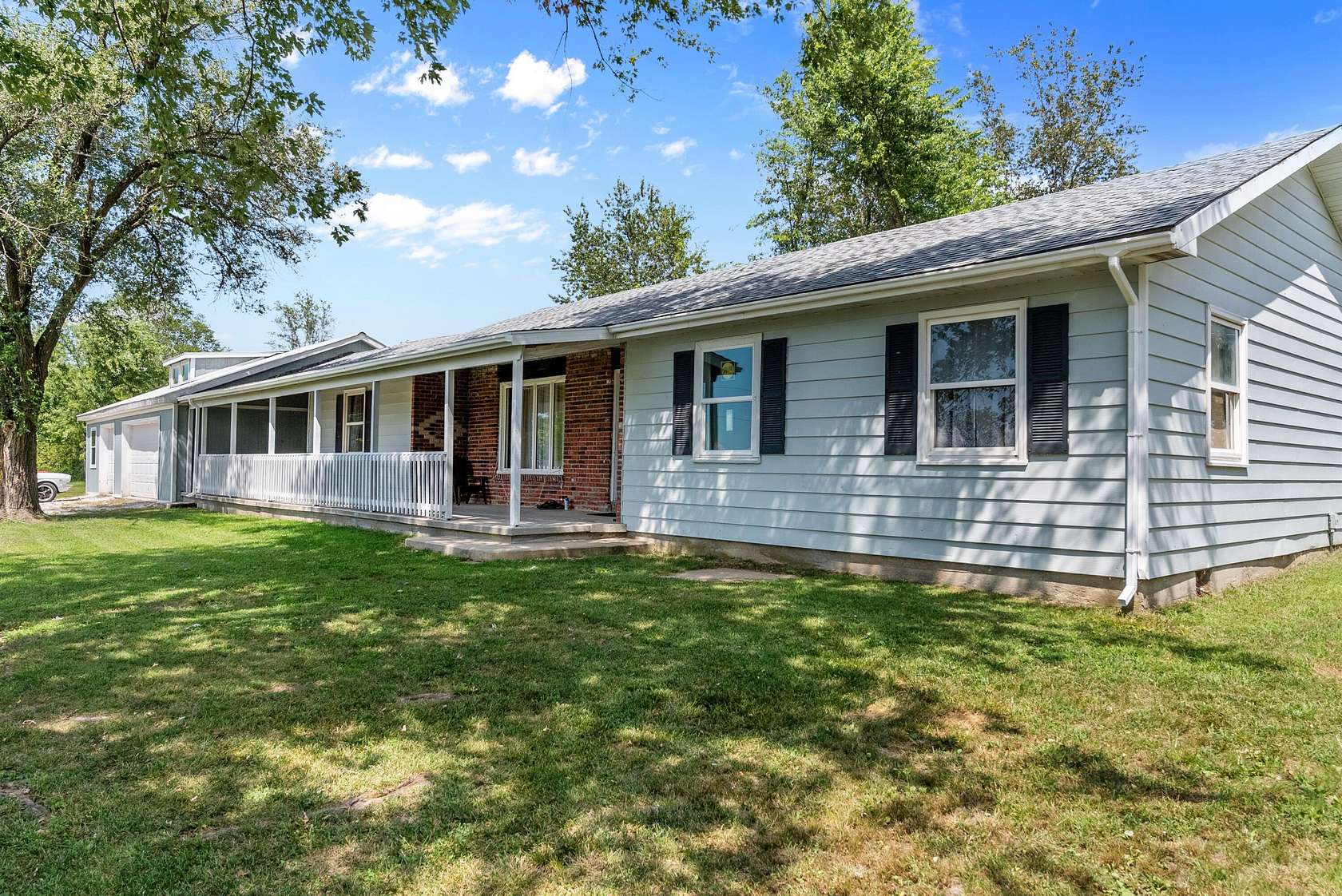 5 Acres of Land with Home for Sale in Bois D'Arc, Missouri