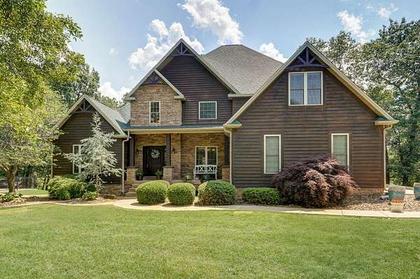 7.9 Acres of Residential Land with Home for Sale in Carthage, Missouri