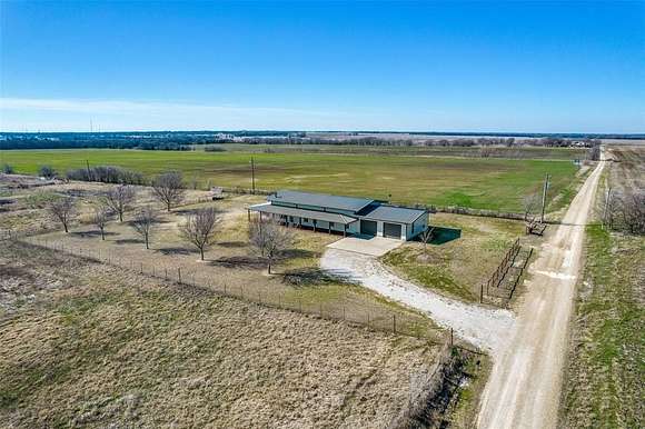 27.761 Acres of Agricultural Land with Home for Sale in Bonham, Texas