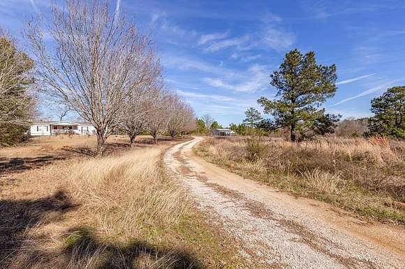 2.993 Acres of Residential Land with Home for Sale in San Augustine, Texas