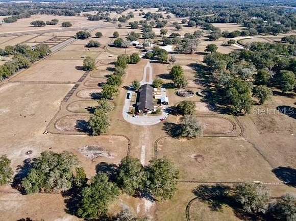 31.13 Acres of Agricultural Land with Home for Sale in Reddick, Florida