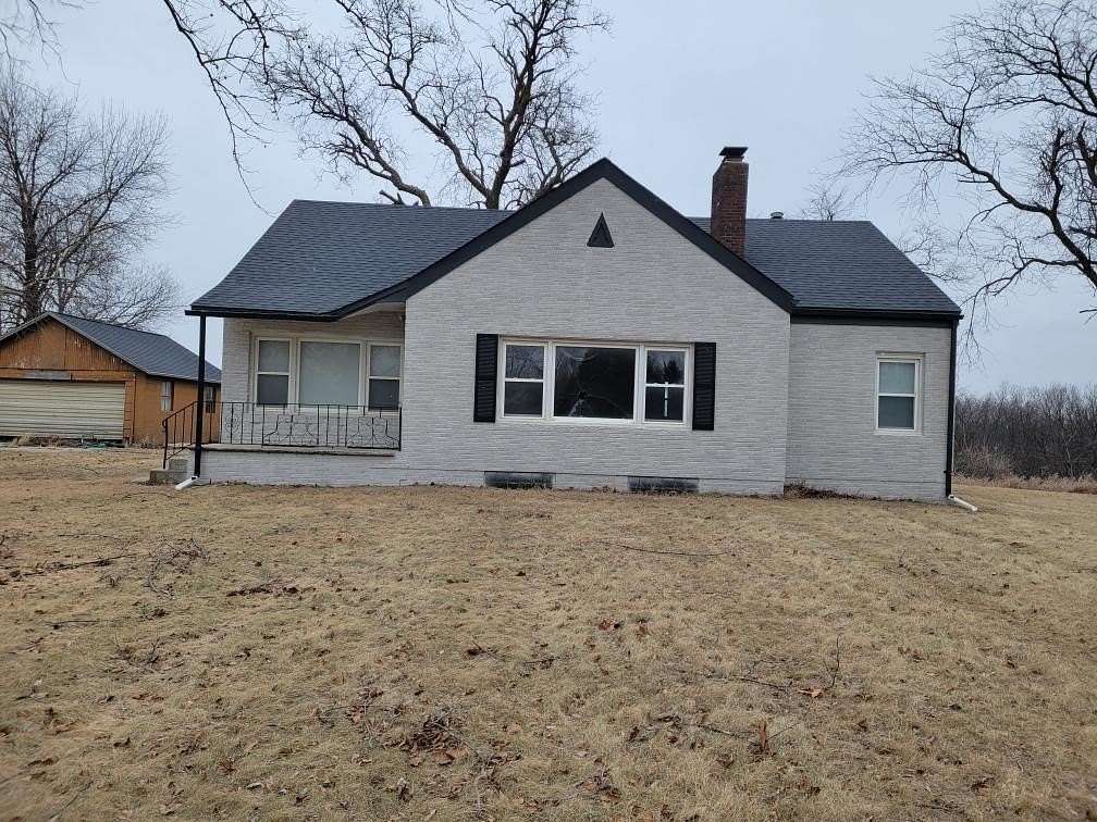 7.5 Acres of Residential Land with Home for Sale in Norwalk, Iowa