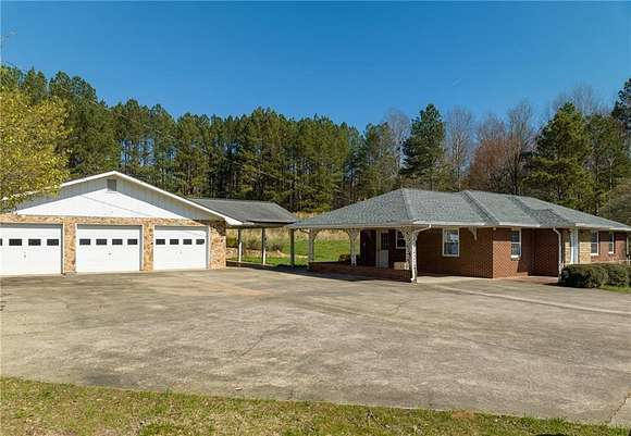 11.2 Acres of Land with Home for Sale in Morganton, Georgia