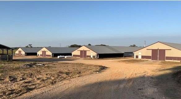 10 Acres of Land with Home for Sale in Gravette, Arkansas