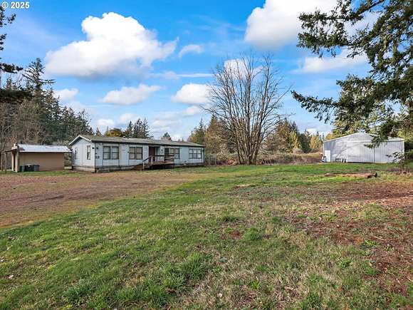 7.67 Acres of Land with Home for Sale in Estacada, Oregon