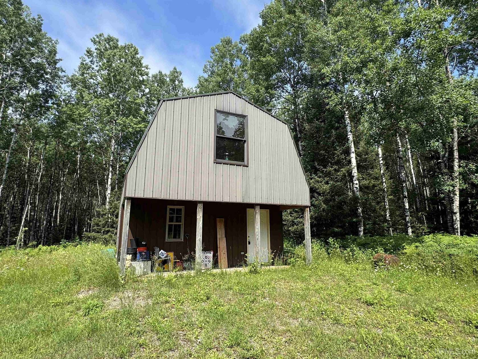 20 Acres of Recreational Land with Home for Sale in Crystal Falls, Michigan