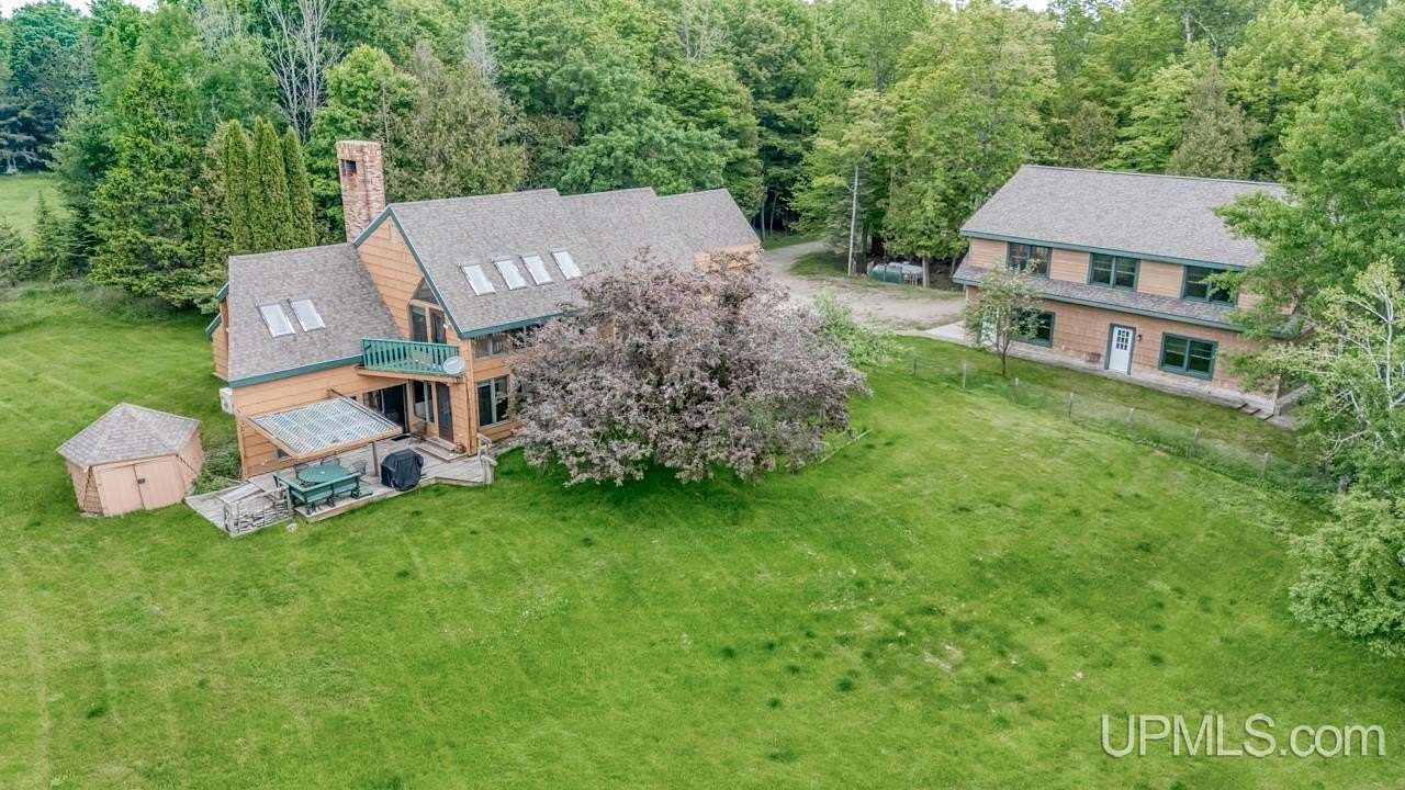 25.9 Acres of Land with Home for Sale in Rapid River, Michigan