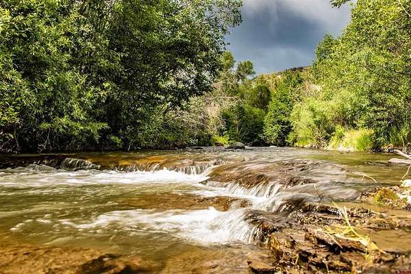 16.8 Acres of Land with Home for Sale in Pagosa Springs, Colorado