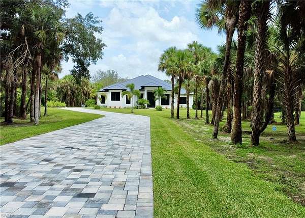 2.27 Acres of Residential Land with Home for Sale in Naples, Florida