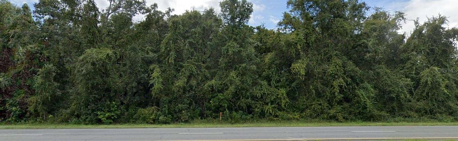 0.26 Acres of Commercial Land for Sale in Chiefland, Florida