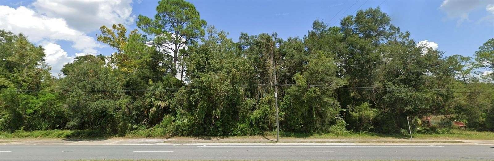 0.67 Acres of Commercial Land for Sale in Chiefland, Florida