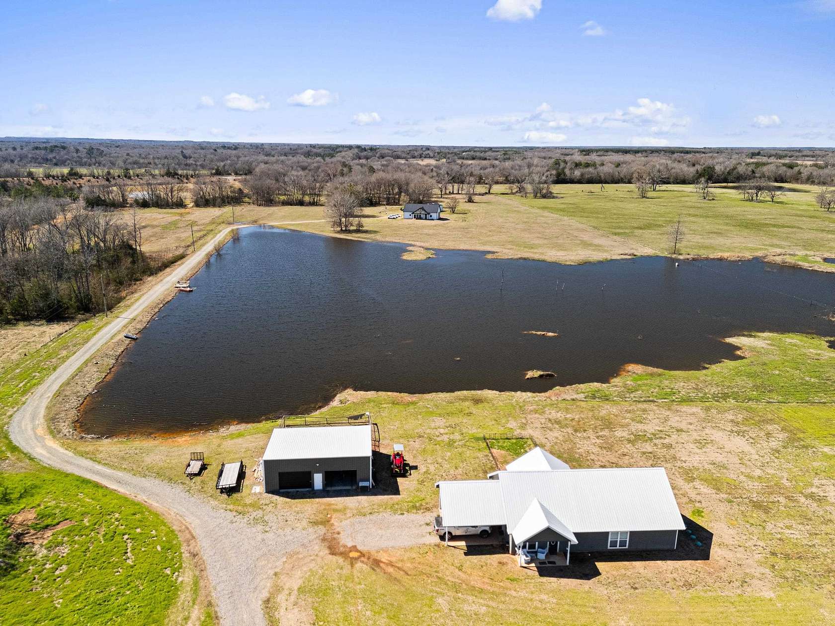 16.3 Acres of Recreational Land with Home for Sale in Pittsburg, Texas