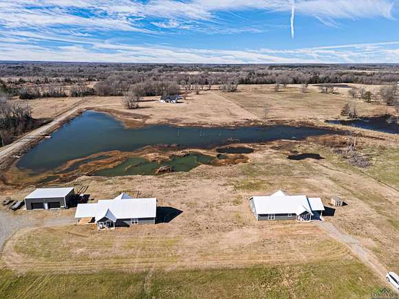 16.25 Acres of Recreational Land with Home for Sale in Pittsburg, Texas