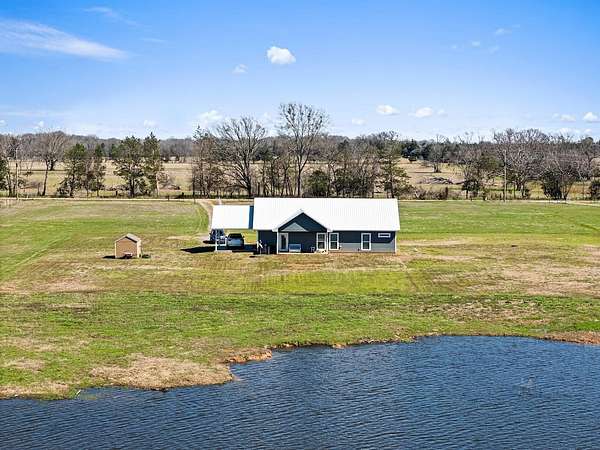 2 Acres of Land with Home for Sale in Pittsburg, Texas
