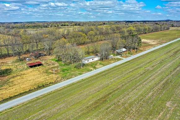 7.7 Acres of Residential Land with Home for Sale in Gleason, Tennessee