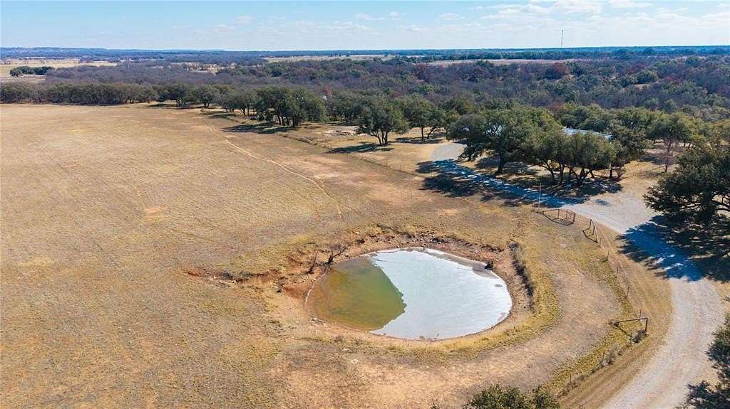 82.5 Acres of Recreational Land with Home for Sale in May, Texas