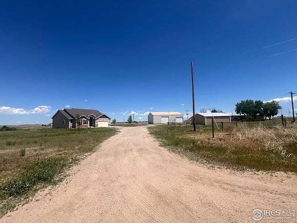 2.19 Acres of Residential Land with Home for Sale in Wiggins, Colorado