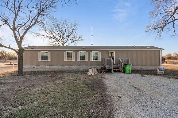 26.2 Acres of Land with Home for Sale in Cherryvale, Kansas